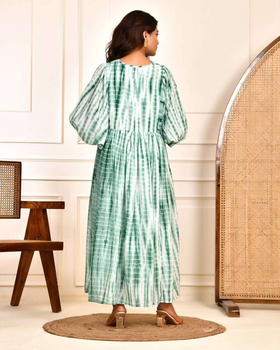 Cotton Tie-Dye V-Neck Sadia Midi Dress with 3/4th Sleeves & Tie-Up Detail worn from the back, showcasing its vibrant design.