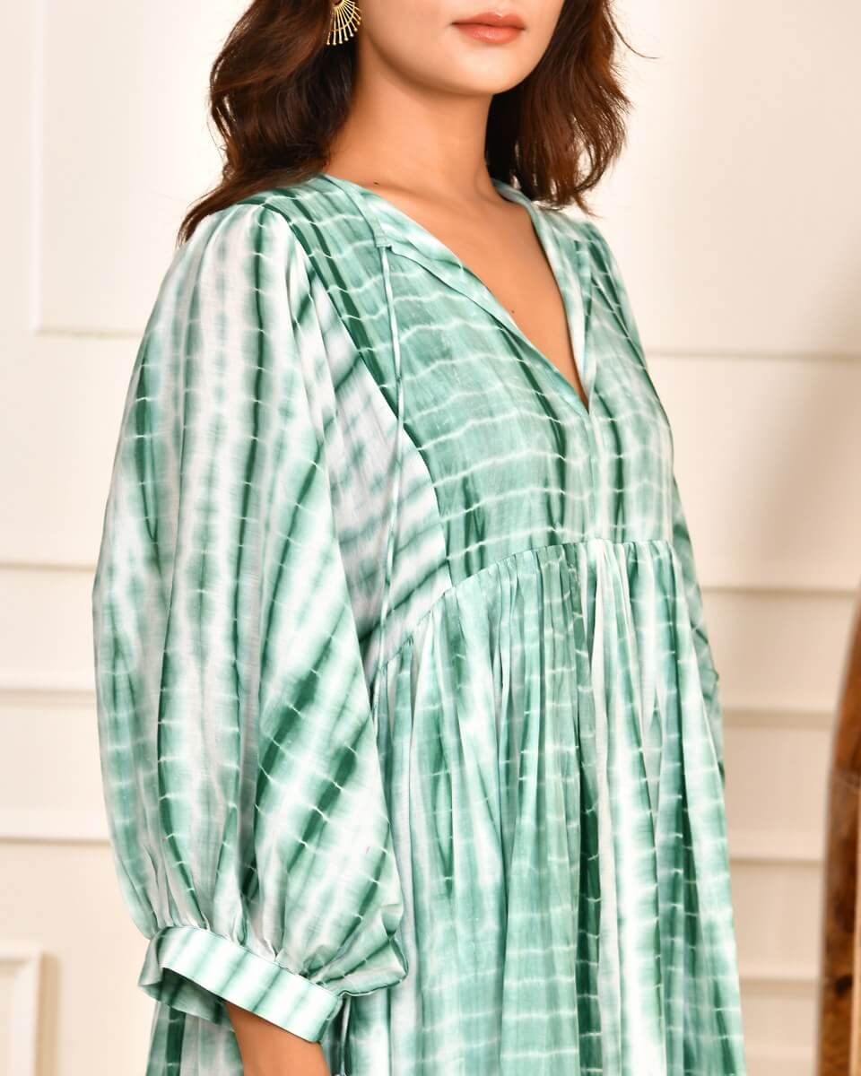 Cotton Tie-Dye V-Neck Sadia Midi Dress with 3/4th Sleeves & Tie-Up Detail featuring a soft green pattern.
